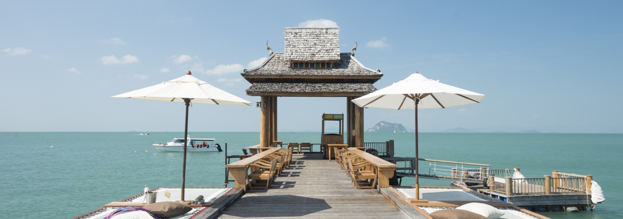 santhiya-koh-yao-ya-resort-pier-restaurant-lounge-parasols-thailandtravel