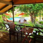 secret-garden-samui-classic-pool-view-bungalow-patio-view-over-pool-thailandtravel